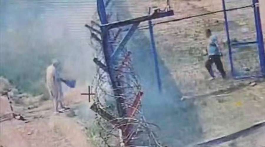 Поджог возле забора